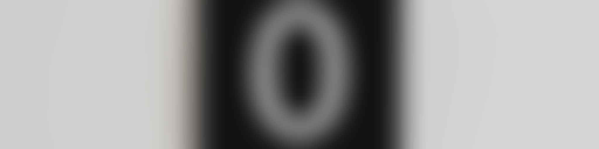 A zero on a sign on the wall