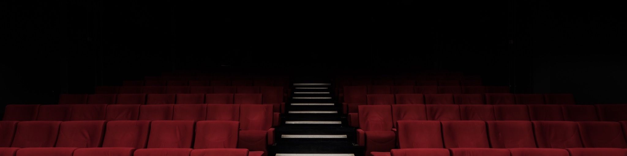 Empty cinema chairs