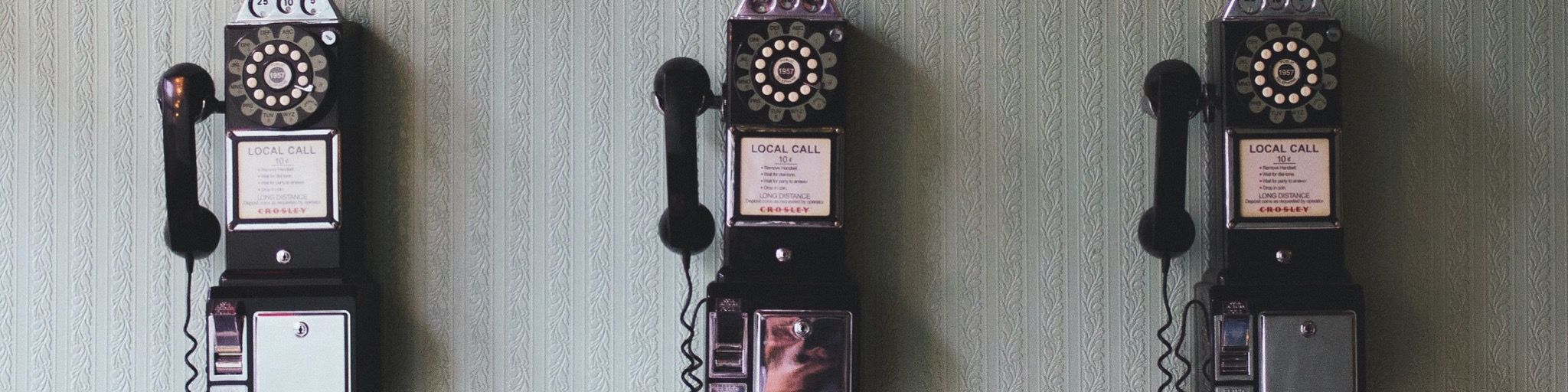 Three old payphones