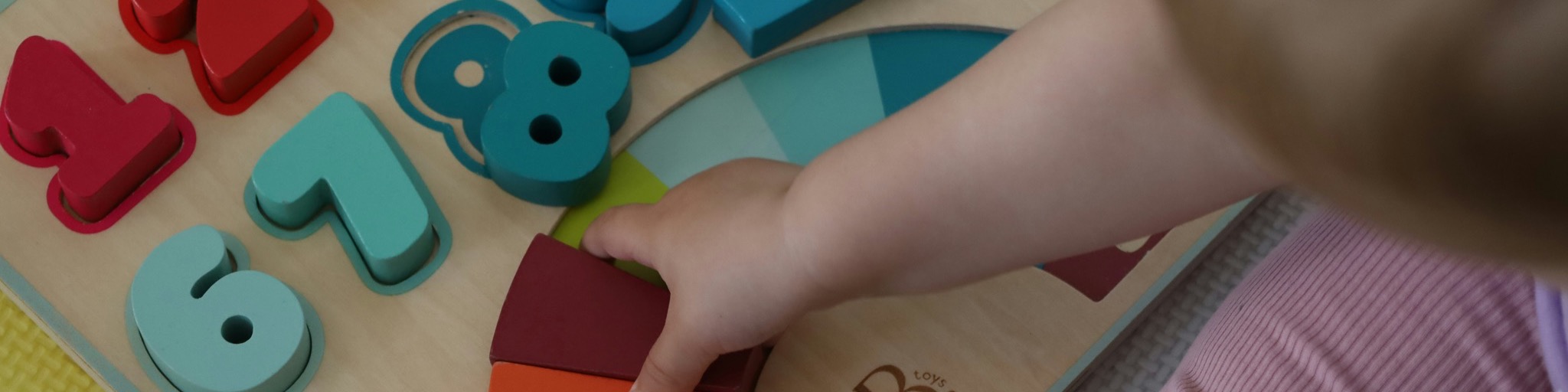 Child playing with numbers